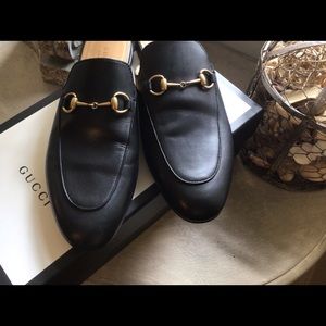 Gucci Black Leather Mules with Gold Detail